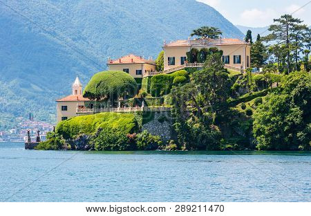 Lake Como, Italy - June 15, 2012: Summer Lake Shore View From Ship Board. Villa Del Balbianello.