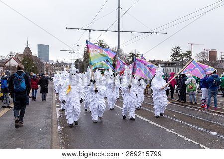 Basel, Switzerland - March 11, 2019: Participants At The Parade Of The Carnival Of Basel. The Carniv
