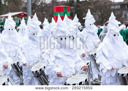 Basel, Switzerland - March 11, 2019: Participants At The Parade Of The Carnival Of Basel. The Carniv