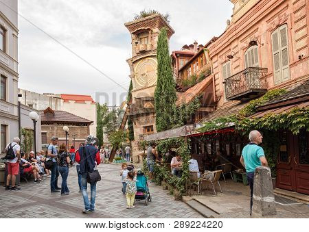Tbilisi, Georgia - September 22, 2018: Crowd Of Tourists Near The Rezo Gabriadze Puppet Theater With