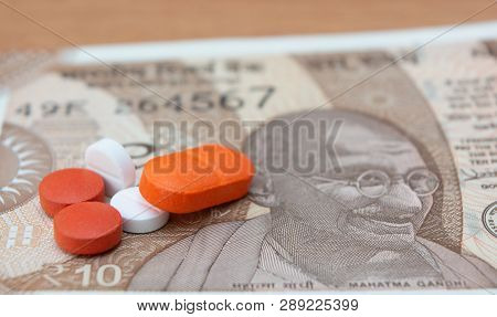 Concept Of The Affordable Medicine In India Due To Generic Drugs On Indian Currency Notes As Backgro