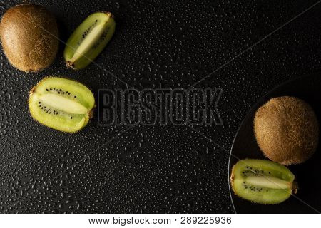 Kiwi Fruit Isolated On Black Background, Fresh Kiwi Fruit. Summer Vitamine Fruit. Healthy Food Or De