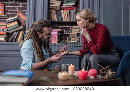 Nice Bearded Man Touching A Young Womans Hand