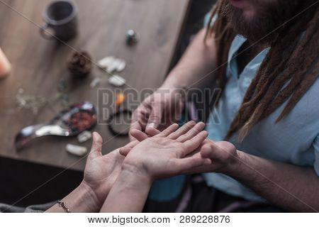 Top View Of A Palm Reading Process