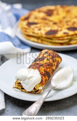 Norwegian Potato Pancakes Lefse With Sour Cream.