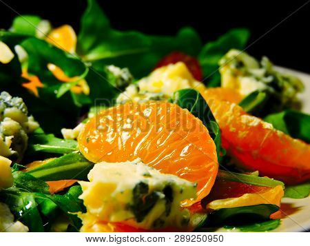 Super Nutritious Beautiful Fitness Salad. Restaurant Presentation. Arugula Salad With Grapes, Mandar