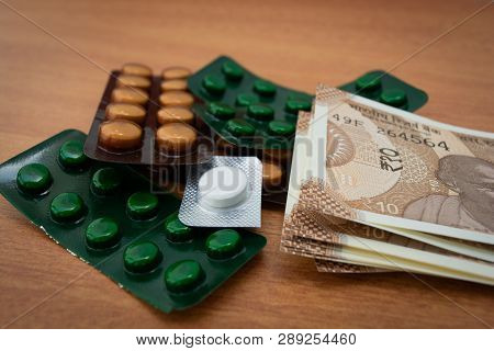 Concept Of The Affordable Medicine In India Due To Generic Drugs On Indian Currency Notes As Backgro
