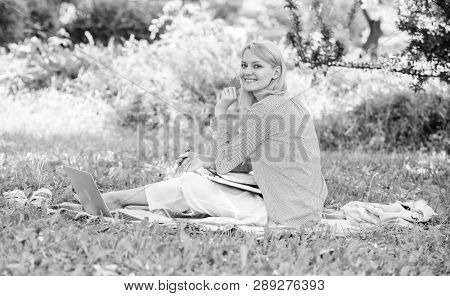 Woman With Laptop Sit Grass Meadow. Best Jobs To Work Remotely. Business Lady Freelance Work Outdoor