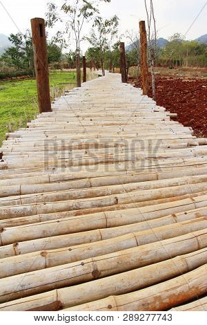 Bridge Over A Cannal In Countryside , Thailand