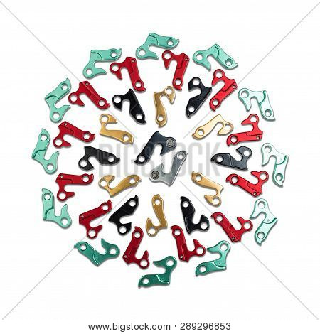 Laid Out Mandala-shaped Hangers For Derailleur Bike On White Background. Bicycle Frame Rear Deraille