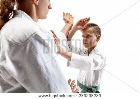 Man And Teen Boy Fighting At Aikido Training In Martial Arts School. Healthy Lifestyle And Sports Co