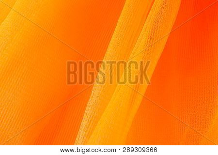 Texture Of Orange Tulle As Background, Closeup