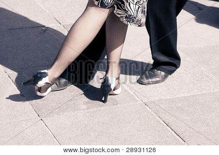 Dançarinos dança tango. Tom envelhecido. Copie o espaço.