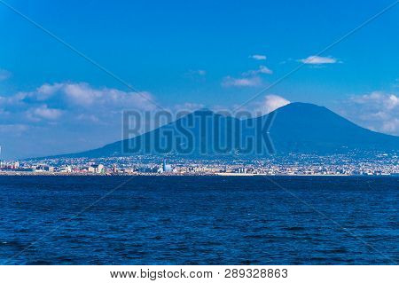 View Of The Coast Of Naples With The Vesuvio From The Blue Mediterranean Sea.