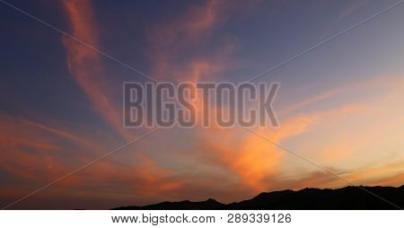 The Light Of The Sunrise In The  Desert