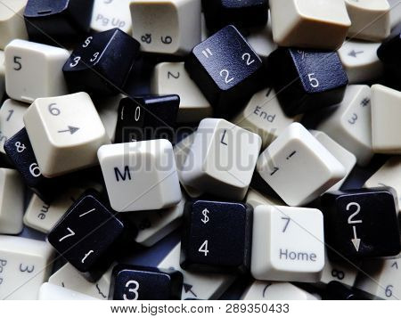 Black And White Computer Keyboard Keys, Mostly Numeric With Ml (machine Learning) Buttons At The Fro