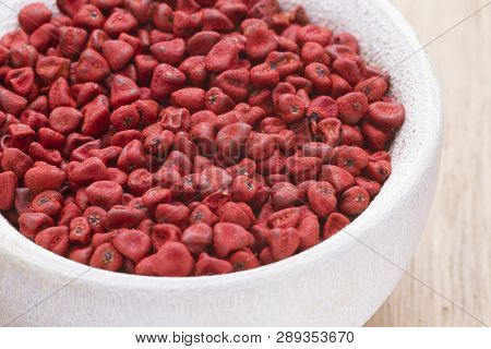Annatto Beans In Bowl On The Table Seen From Up Close