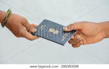 Concept Of Woemn Receving Passport At The Door Step Of The House In India