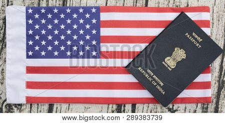 Closeup Of Indian Passport On Usa Or Americas Flag As A Background