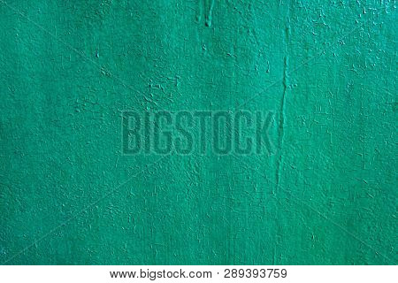 The Green Shagreen Wall. Texture Of The Old Painted Wall. The Color Is Green-arcadia