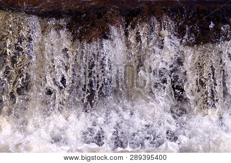 Closeup. Beautiful Sparkling And Splashing Waterfall, Whitewater In Springtime.