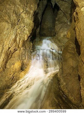 Cave River Cascade Nature Background. Amazing Cave River Waterfall Nature. Nature Background. Nature