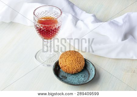A Glass Of Sweet Wine With A Cookie And A Place For Text