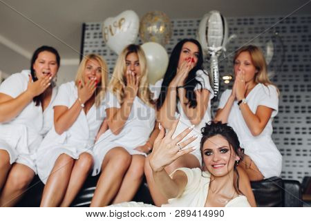 Beautiful And Positive Bide Mades Having Fun On Hen Party.