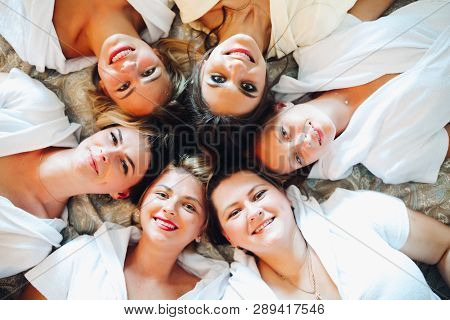 Beautiful And Positive Bide Mades Having Fun On Hen Party.