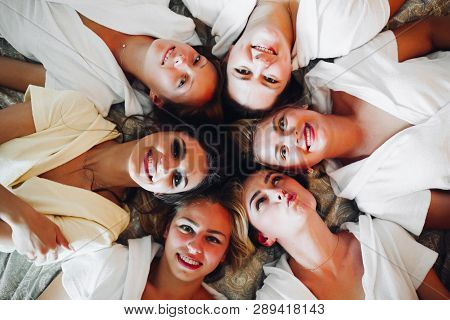 Beautiful And Positive Bide Mades Having Fun On Hen Party.