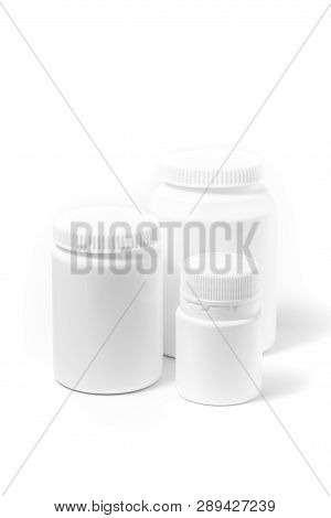 Three Medicine White Pill Bottles Isolated On White Background Stand Nearby. Drugs, Illustrations.