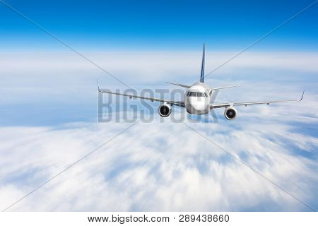 Modern Airplane Mith Motion Blur Effect Travel At Sunny Bright Day.