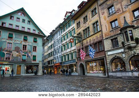 Weinmarkt, Lucerne, Switzerland 16 April 2017. Beautiful Medieval Buildings With Decorated Facades.