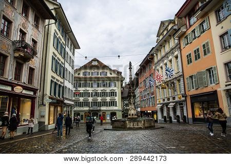 Weinmarkt, Lucerne, Switzerland 16 April 2017. Beautiful Medieval Buildings With Decorated Facades A