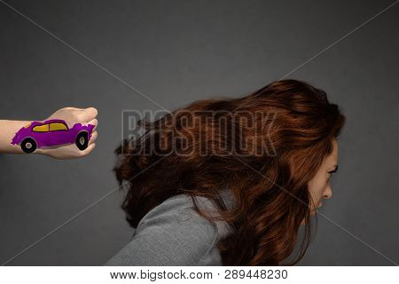 Scene Of A Car Accident, A Car In The Form Of A Fist Knocks A Woman From The Back .the Concept Of Th