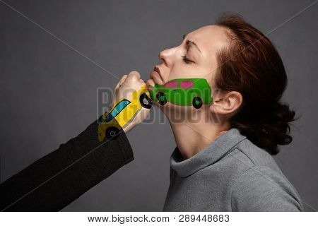 The Concept Of A Car Accident, Insurance.sudden Collision Of Cars . The Woman's Face And On The Fist