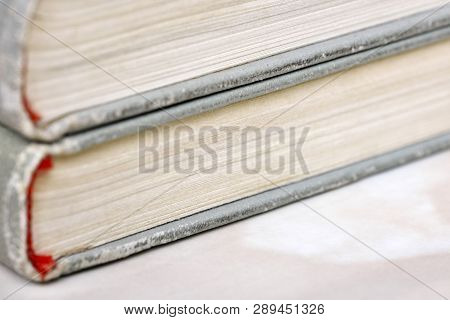 A Few Old Books In A Light Cover Stack On A Table Close-up Design Blank For The Project