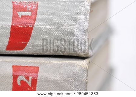 A Few Old Books In A Light Cover Stack On A Table Close-up Design Blank For The Project