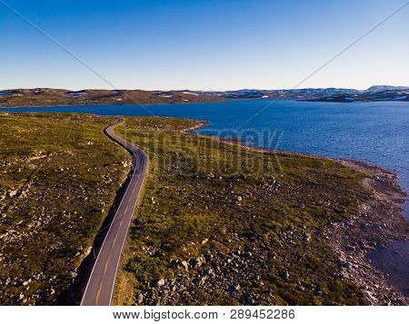 Aerial View. Road Crossing Hardangervidda Plateau, Norway Landscape. National Tourist Hardangervidda