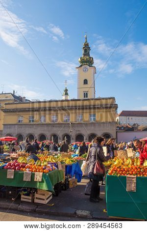 Zagreb, Croatia - December 29th 2018. Customers Shop For Fresh Fruit And Vegetables At The Dolac Mar