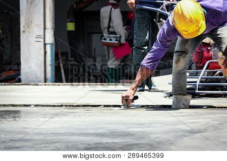 Construction Labor, Plasterer Concrete Cement Work. Using A Trowel To Smooth Or Leveling Concrete Sl