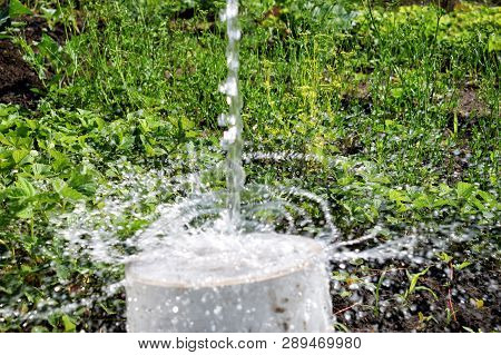 Flowing Out Of Water To Surface With Splash