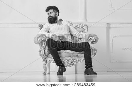 Connoisseur Of Literature Concept. Macho Spends Leisure With Book. Man With Beard And Mustache Sits 