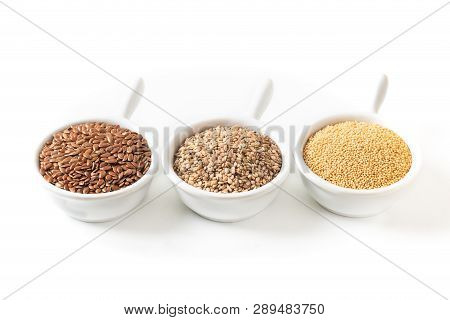 Healthy Food Ingredents 3 Kind Of Gluten Free Grains Flax, Amaranth And Sesame Seeds On White Backgr