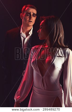 Classic Romance Issue. Couple In Love With Mime Makeup. Mime Man And Woman Act In Romantic Scene. Th