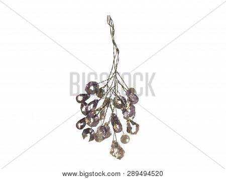 Decoration In The Form Of A Cluster Of Glass Crystals Attached To A Silver Wire Isolated On A White 