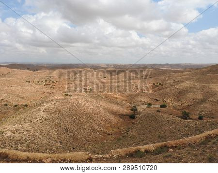 Desert Landscape Near Matmata In Southern Tunisia, North Africa.