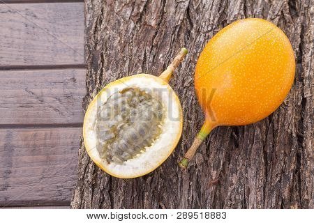 Passion Fruit Granadilla On The Table - Passiflora Ligularis