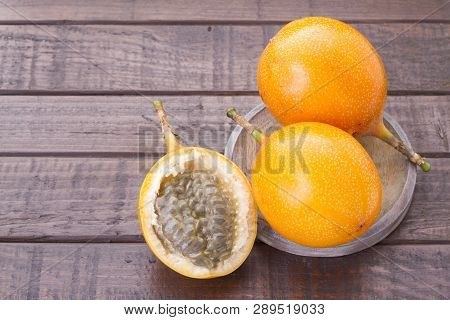 Passion Fruit Granadilla On The Table - Passiflora Ligularis