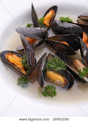 plaat van Mossel met wijn saus